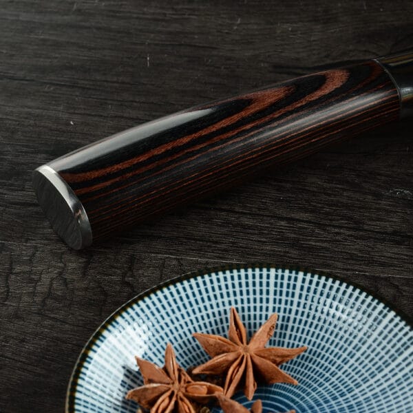 Nakiri stainless steel knife with 17cm blade, offering easy maintenance and sharp performance.
