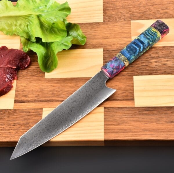 "Epoxy-secured cured wooden handle of the 20.5cm Damascus Kiritsuke knife offering stylish grip and comfort."