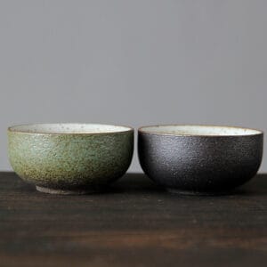 Japanese stoneware teacup in black, perfect for green tea or matcha