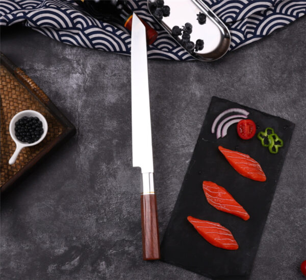 Hand-sharpened Sato Yanagiba Knife resting on a cutting board, perfect for sushi chefs