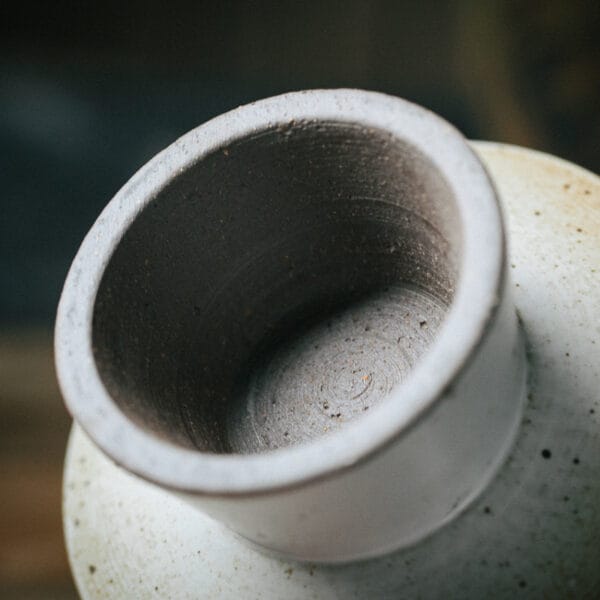 Close-up of a 13cm Japanese Stoneware Serving Bowl, showcasing its smooth ceramic finish and 5.6cm depth.