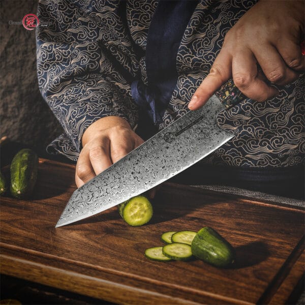 The Kiritsuke knife’s blade edge reflecting light, demonstrating its machine-sharpened, ultra-sharp cutting surface.