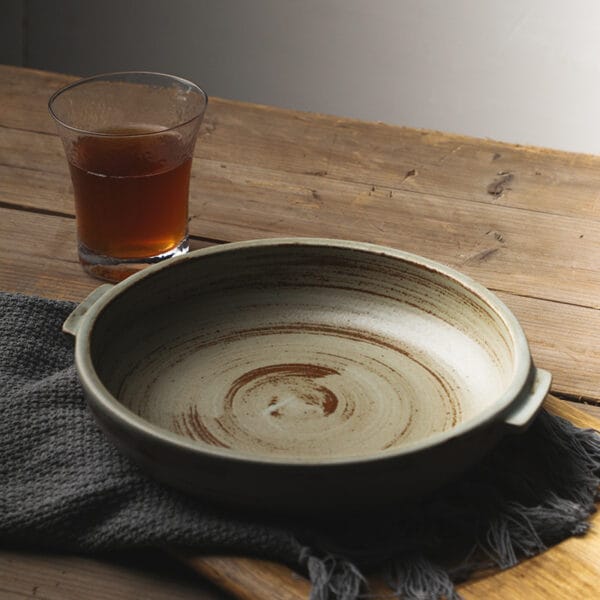 Large single-colour double-ear dinner plate in white, showcasing its 520gm weight and elegant handles."