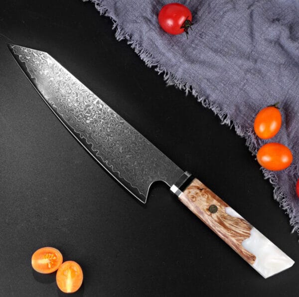 Japanese-style chef knife with white stabilized wood and resin handle