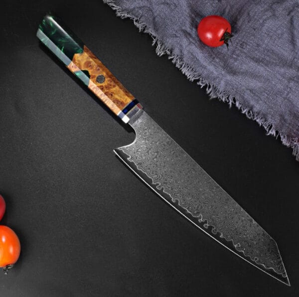 Full view of resin-handled Japanese chef knife in green with octagonal profile.