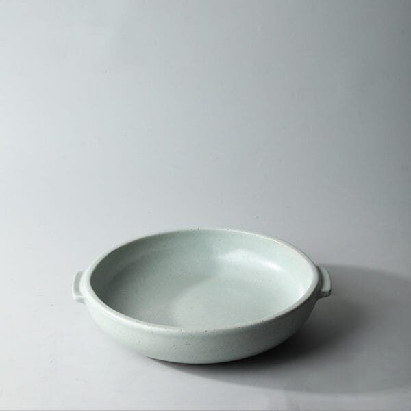 Large single-colour double-ear dinner plate in white, showcasing its 520gm weight and elegant handles.