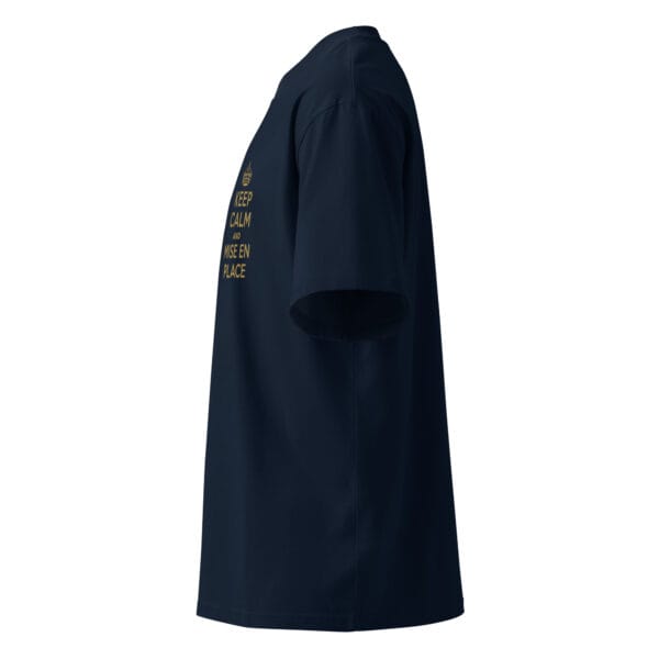 Side profile of black oversized unisex t-shirt with relaxed fit and dropped shoulder